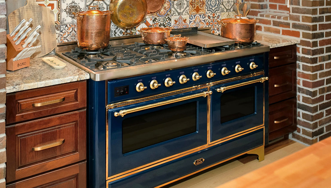 Brass hardware kitchen design with ILVE range in luxury interior