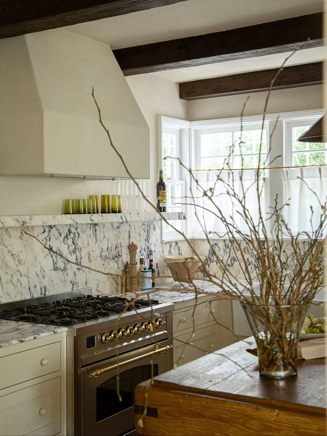 ILVE USA Media Center 33 Carthay Square kitchen renovation with antique island, marble backsplash, and ILVE range