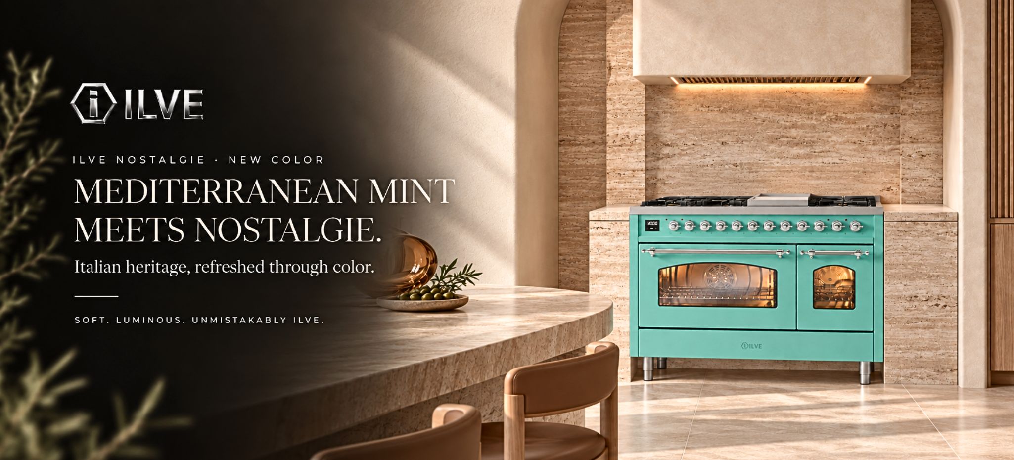 ILVE Nostalgie range in Mediterranean Mint with Chrome trim in a warm stone luxury kitchen